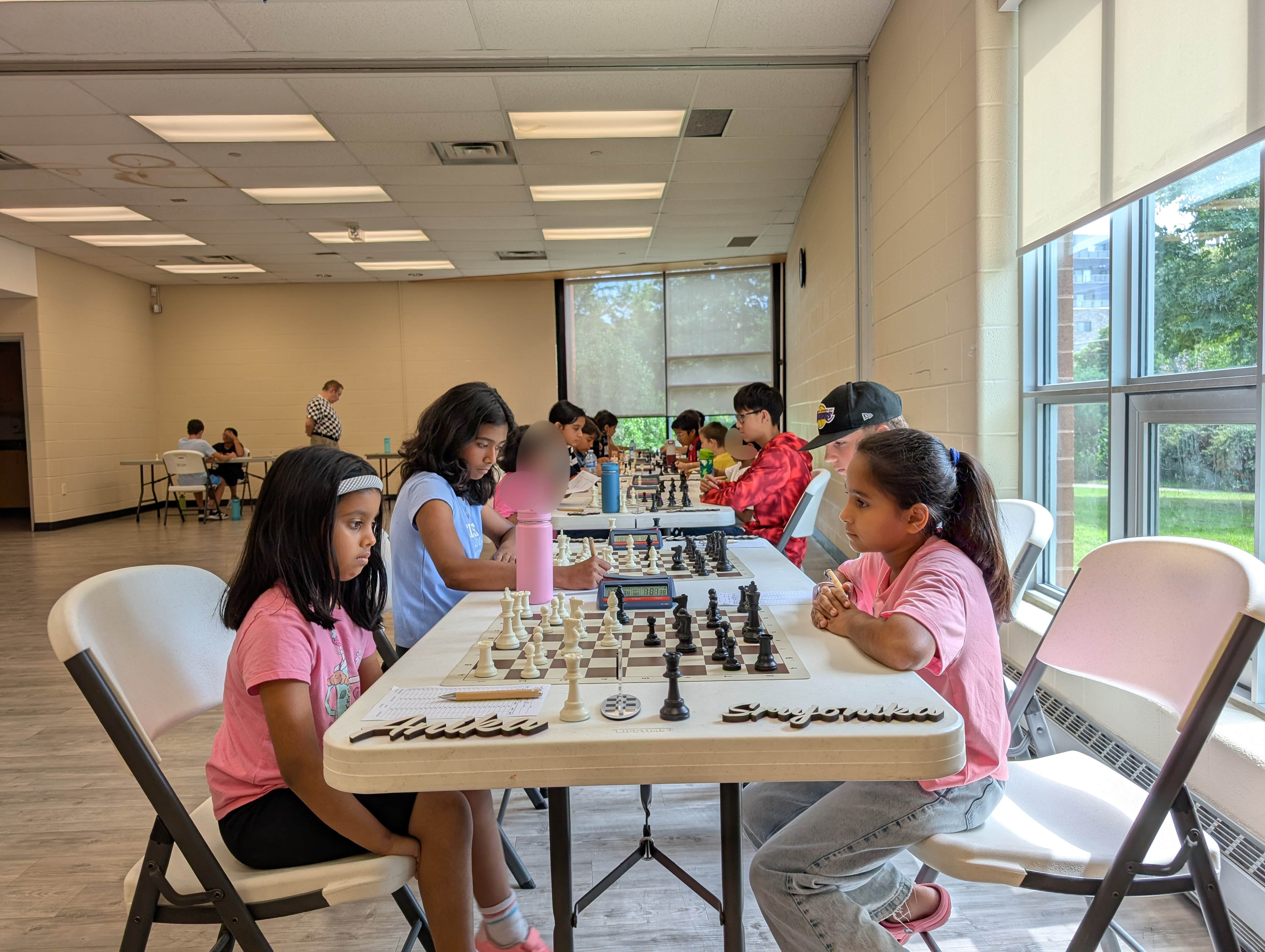 Young players competing at the Victory August Classical Open