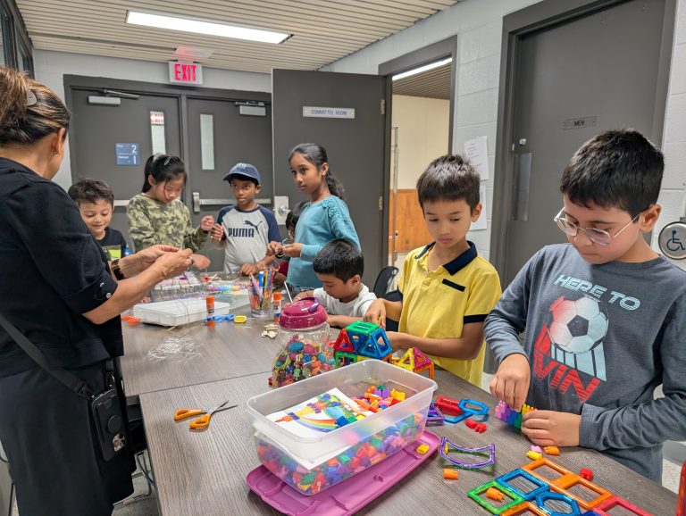 Children enjoying the craft table at the Victory Etobicoke Youth Open