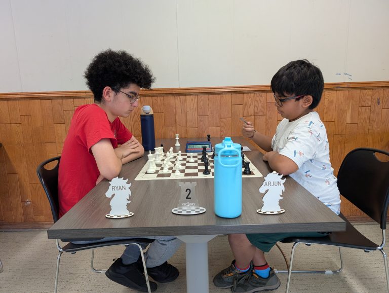 Two players concentrating during their tournament game